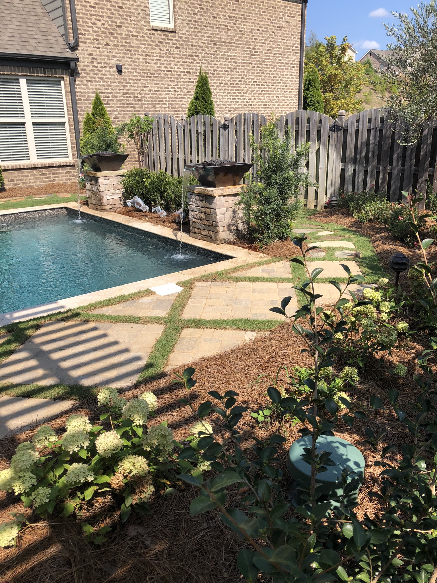 Travertine pool deck and patio installation project in South Florida.